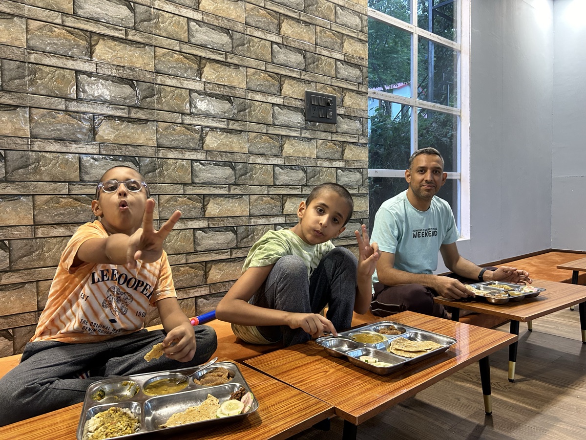Family yoga session — togetherness in the forest ashram