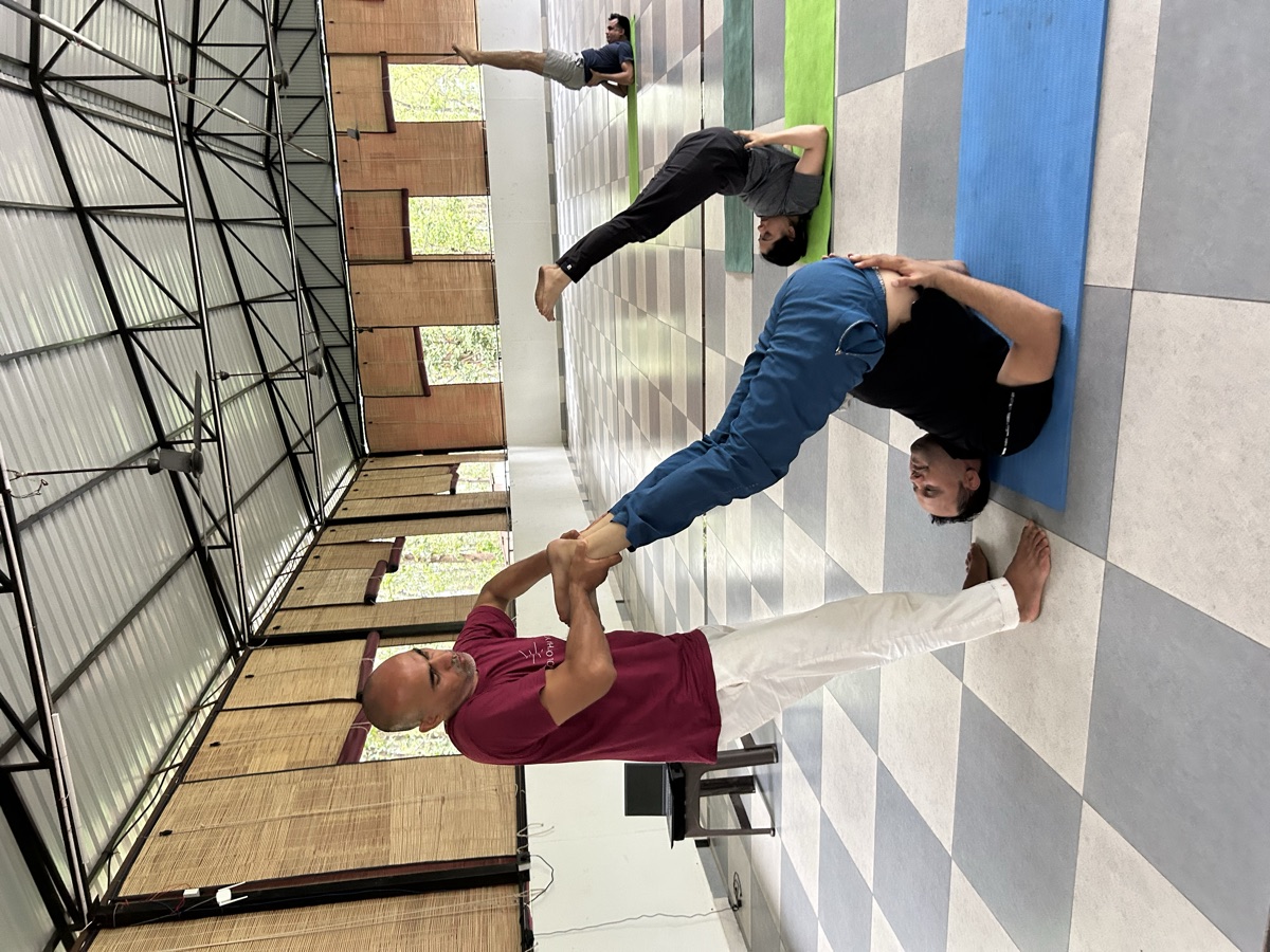 Hatha Yoga TTC students in group practice at School of Hatha Yoga Dehradun