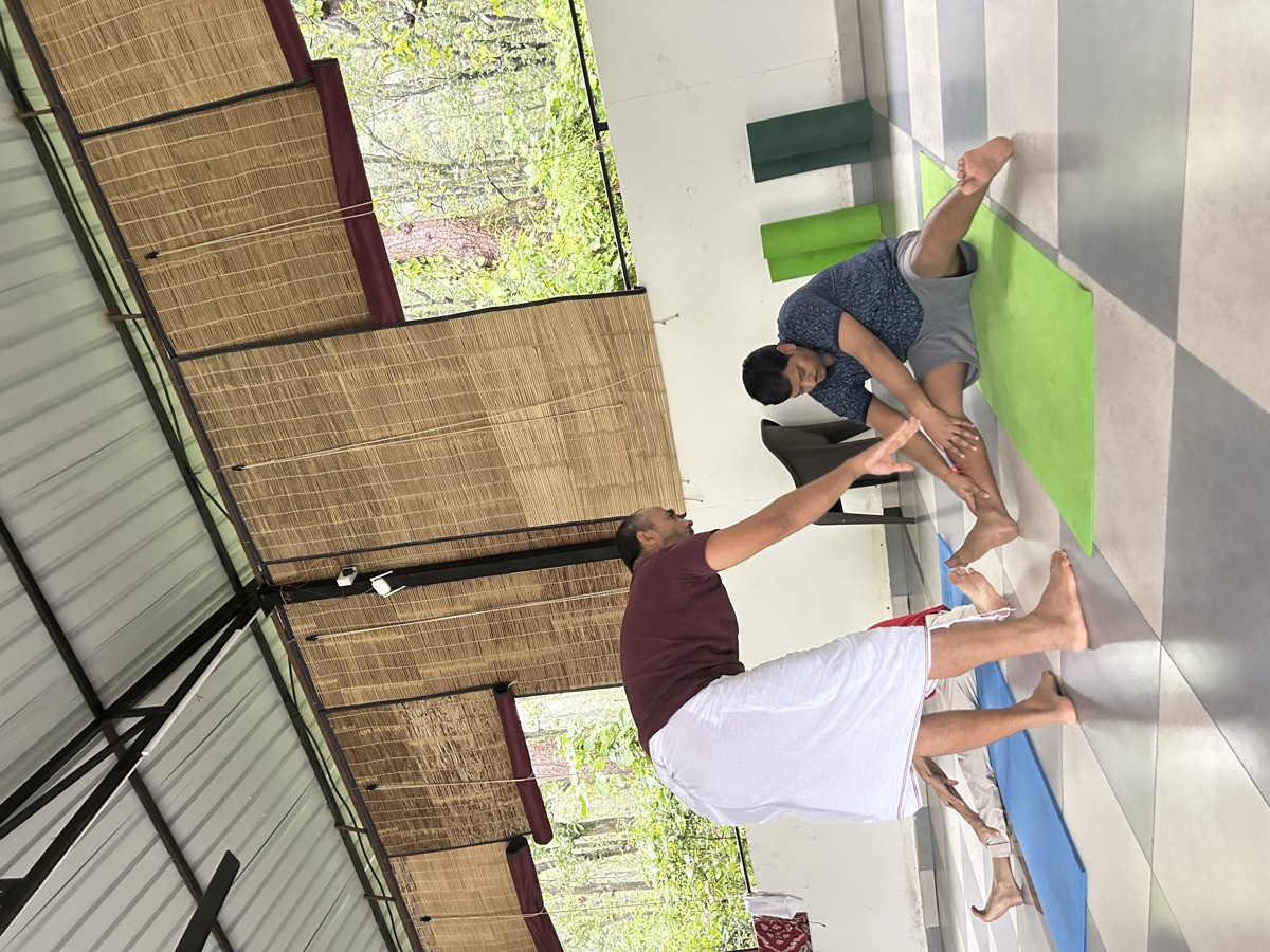 Yoga class led by Yogacharya Yogender Singh Ji at the ashram